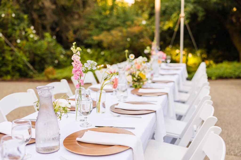 Bride and groom embracing during their Robinswood House wedding in Bellevue on a sunny summer day