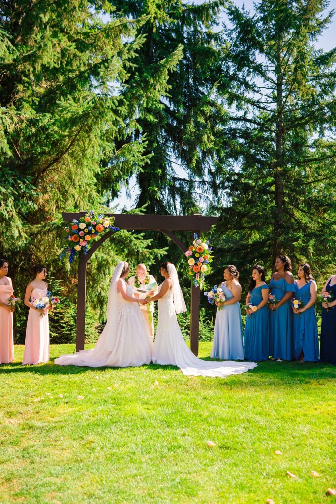 Same-sex wedding ceremony for Crystle and Leona at Trinity Tree Farm in Washington