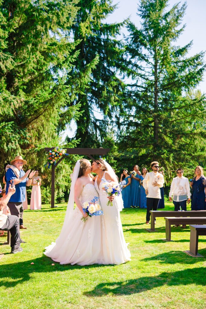 Same-sex wedding ceremony for Crystle and Leona at Trinity Tree Farm in Washington