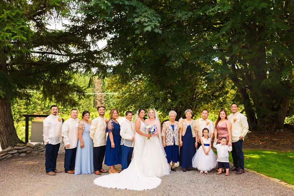 Same-sex wedding ceremony for Crystle and Leona at Trinity Tree Farm in Washington
