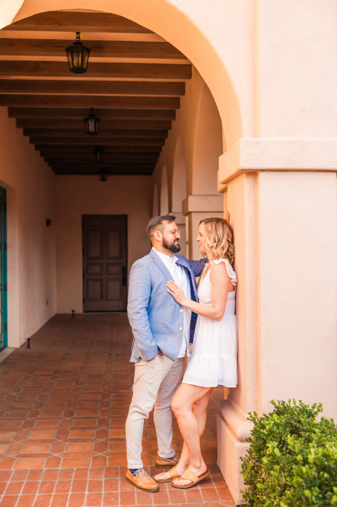 Victoria and Jonathan beneath the banyan tree during their Music Academy of the West engagement photos in Santa Barbara.