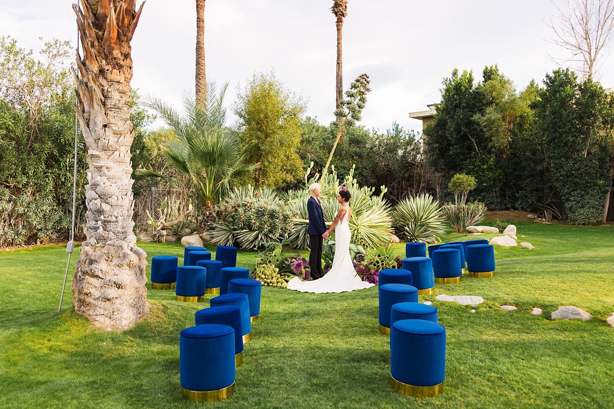 Same-sex couple ceremony setup at a Cree Estate wedding in Palm Springs with colorful seating