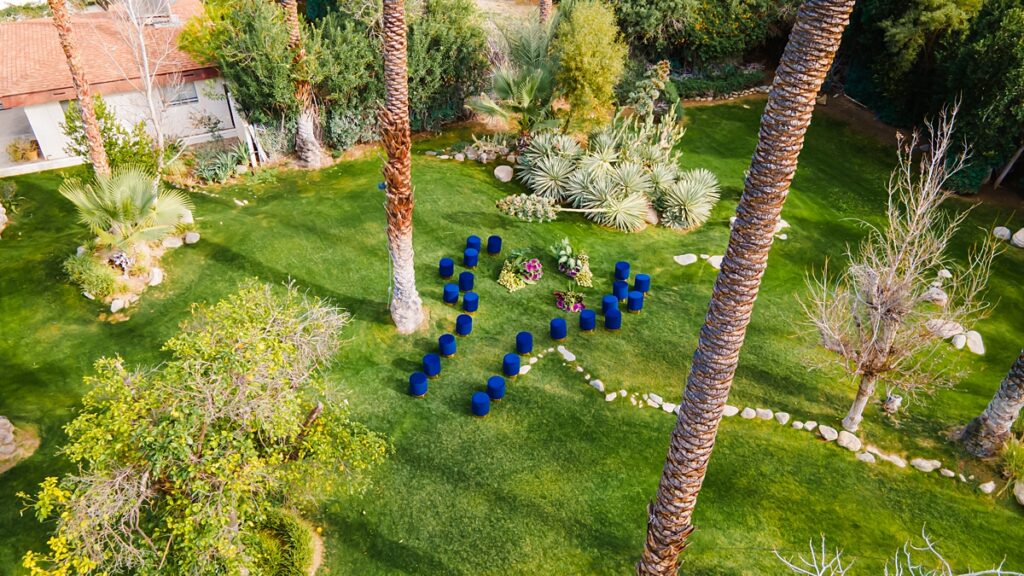 Same-sex couple ceremony setup at a Cree Estate wedding in Palm Springs with colorful seating