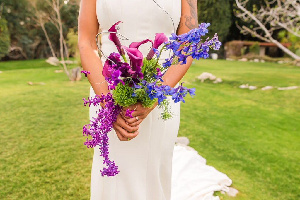 Same-sex couple ceremony setup at a Cree Estate wedding in Palm Springs with colorful seating