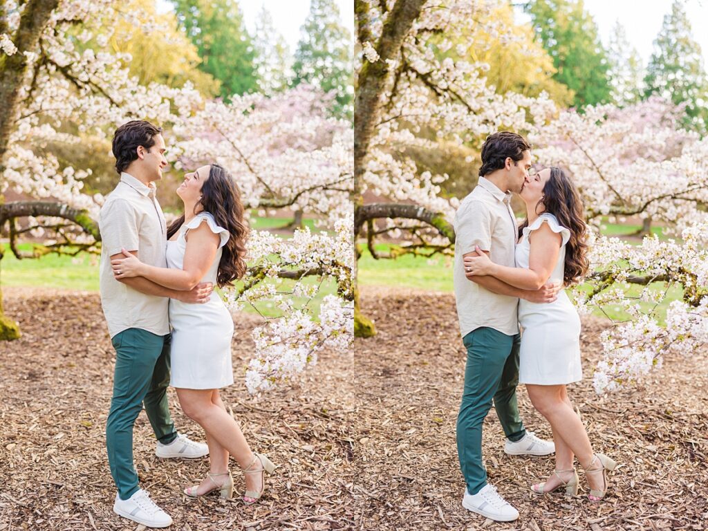 Seattle engagement photos at Washington Park Arboretum with cherry blossoms and couple embracing