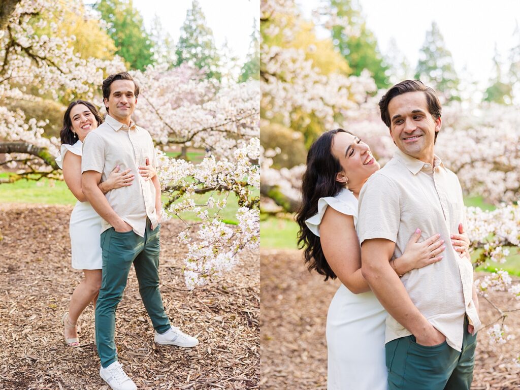 Seattle engagement photos at Washington Park Arboretum with cherry blossoms and couple embracing