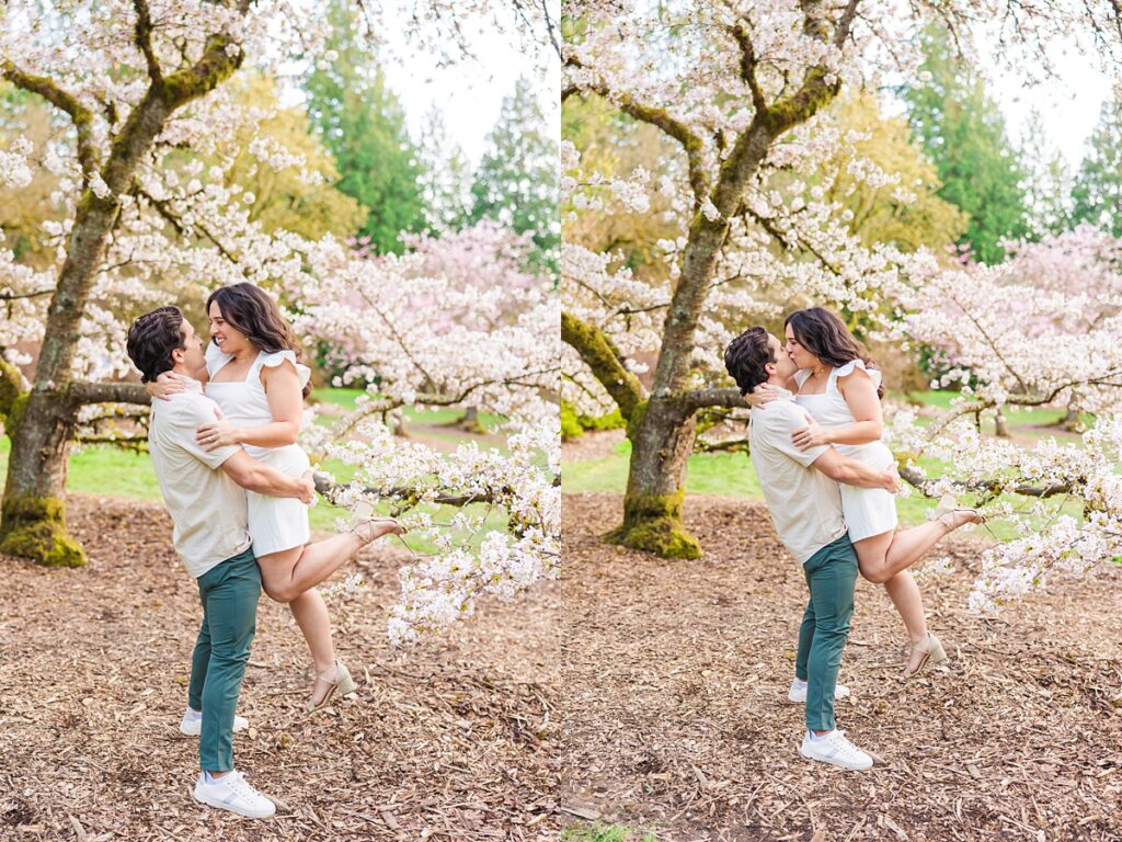 Seattle engagement photos at Washington Park Arboretum with cherry blossoms and couple embracing