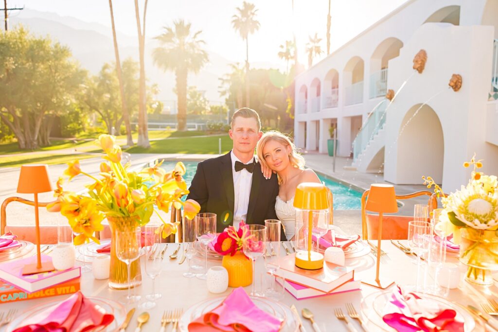 Bride and groom portraits beside the pool at Casa Palma in Palm Springs with mountain views